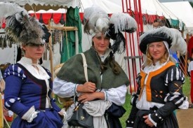 Three women dressed in medieval costume
